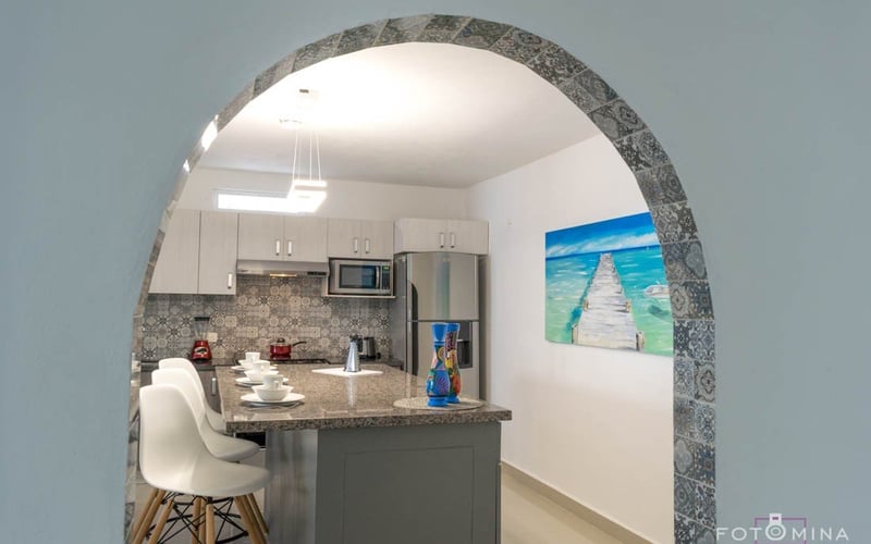 Kitchen through arch