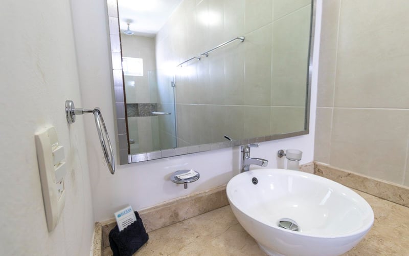 Bathroom with round vessel sink